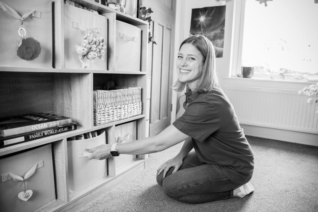 Georgina organising a childrens playroom